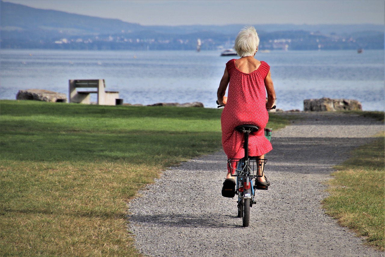 Dam på cykel