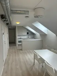 Student dorm room with bed