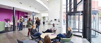 Students in the entrance of Service Center 